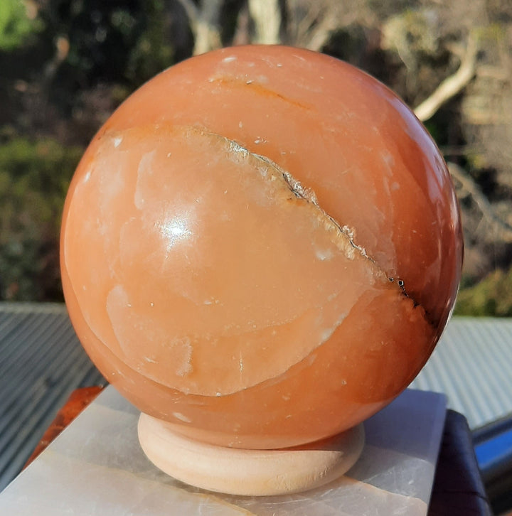 Orange Calcite Sphere (920g) With Stand